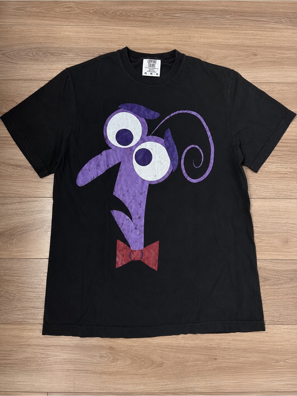 Black Graphic Tee with Purple Cartoon Face & Red Bow